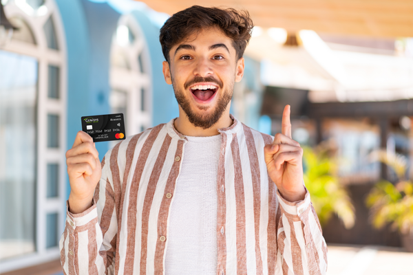 Happy man with credit card 