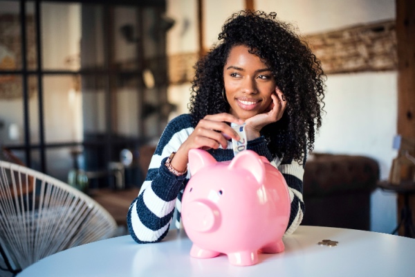 Woman with piggy bank